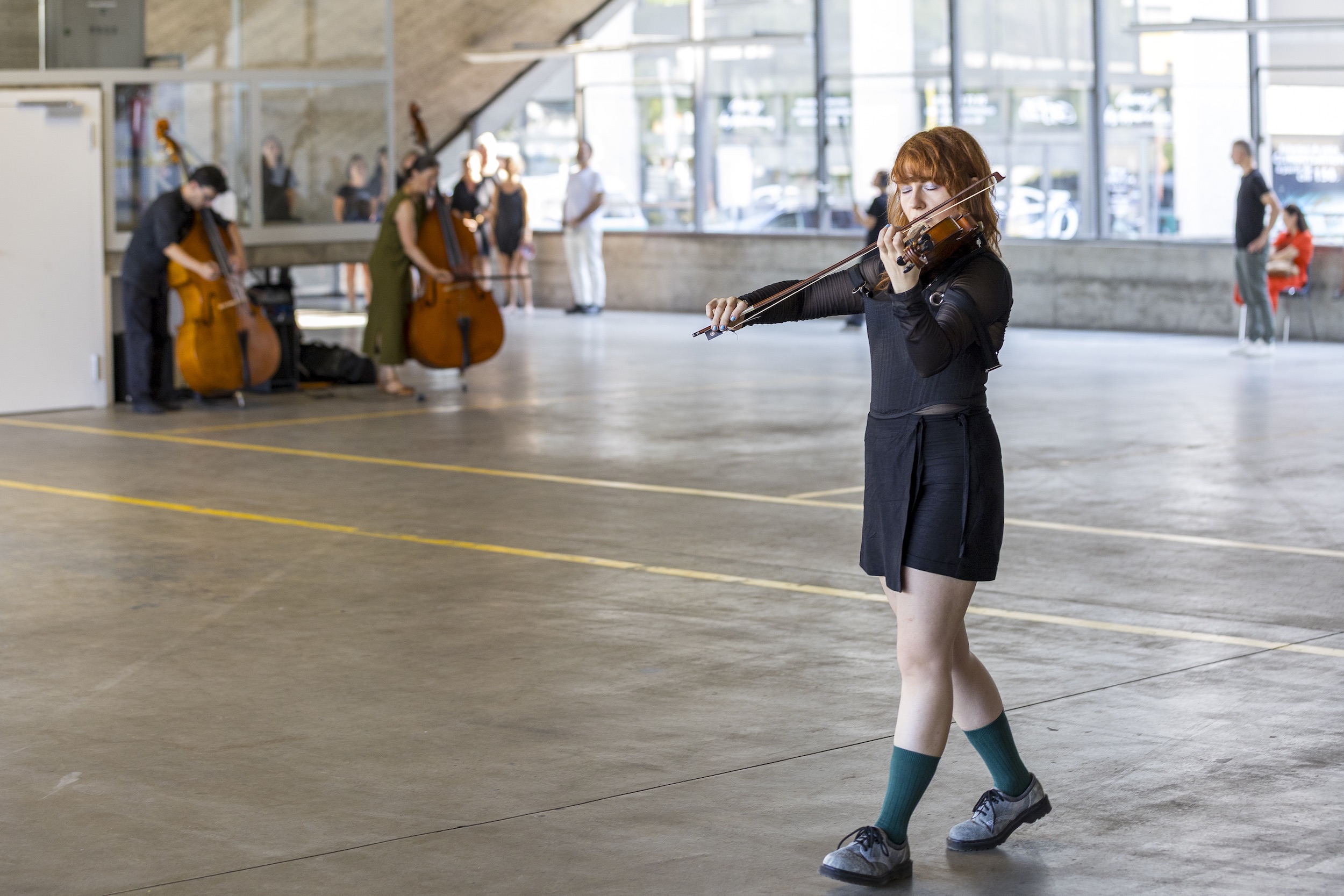 Performance documentation of more heat than light by LABOUR (Farahnaz Hatam & Colin Hacklander) at Pavillon Siclin Geneva 10